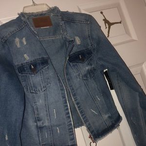 Never worn xl distressed fashionnova jean jacket